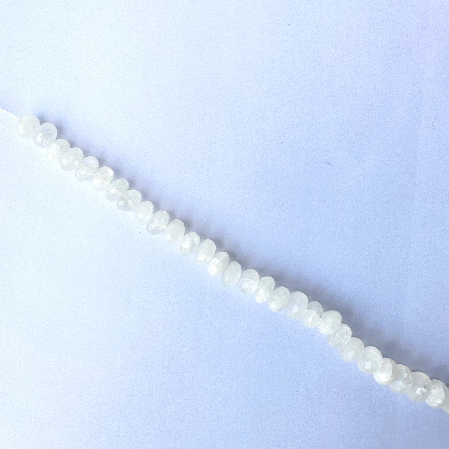 High-quality moonstone rondelles with 0.5mm bead holes and radiant shine.