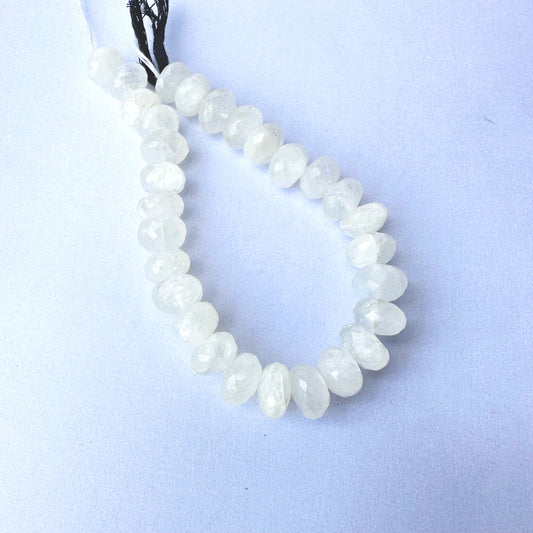 Moonstone rondelle beads with 10-10.5mm size and faceted cut on a 19cm strand.