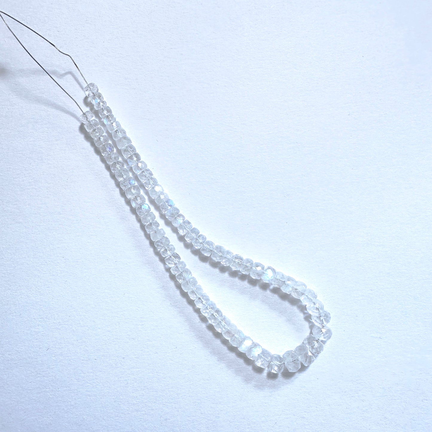 Australian gemstone bead supplier showcasing Moonstone beads with 0.5mm drill holes and consistent clarity.