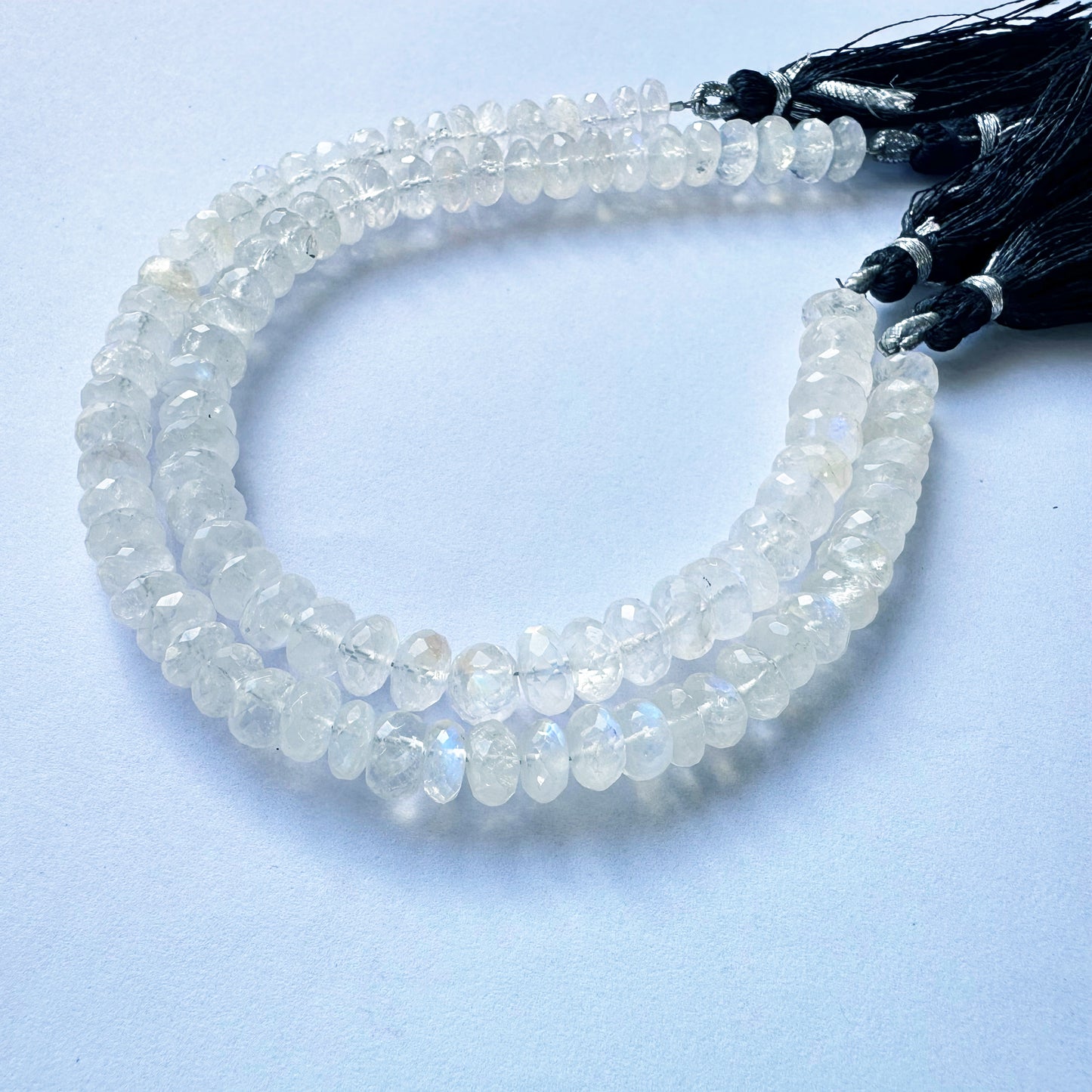 Moonstone beads with pastel colour and sparkly finish on a neat strand.