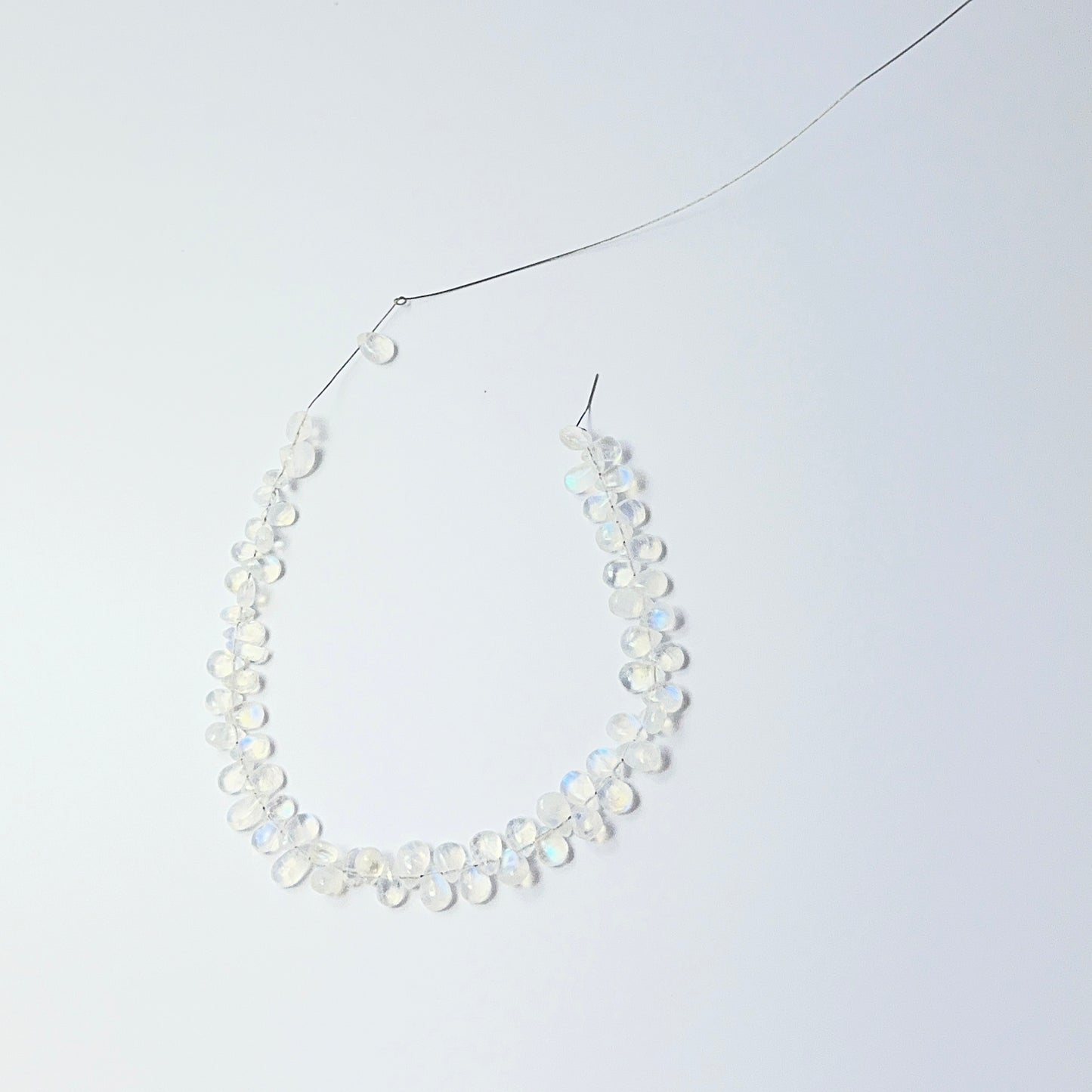 Detailed Moonstone 6–7mm × 4.5–5mm teardrops showing soft iridescence, ideal for gemstone beads for DIY jewellery.