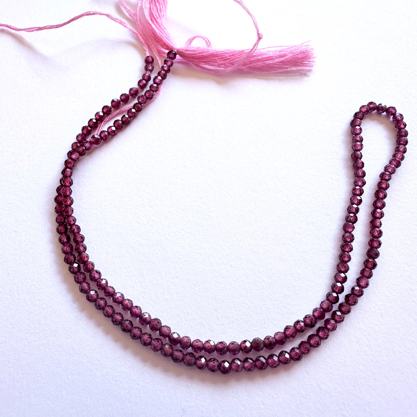 Mozambique Garnet faceted rondelle beads with deep red sparkle for handmade jewellery components.