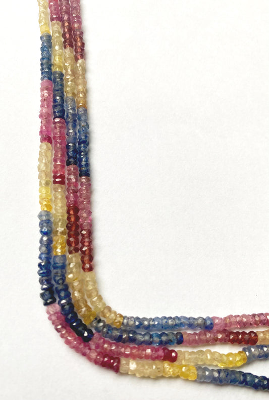 Close-up of Multi Precious beads highlighting vivid colour range, excellent shine, and precise faceted cuts.