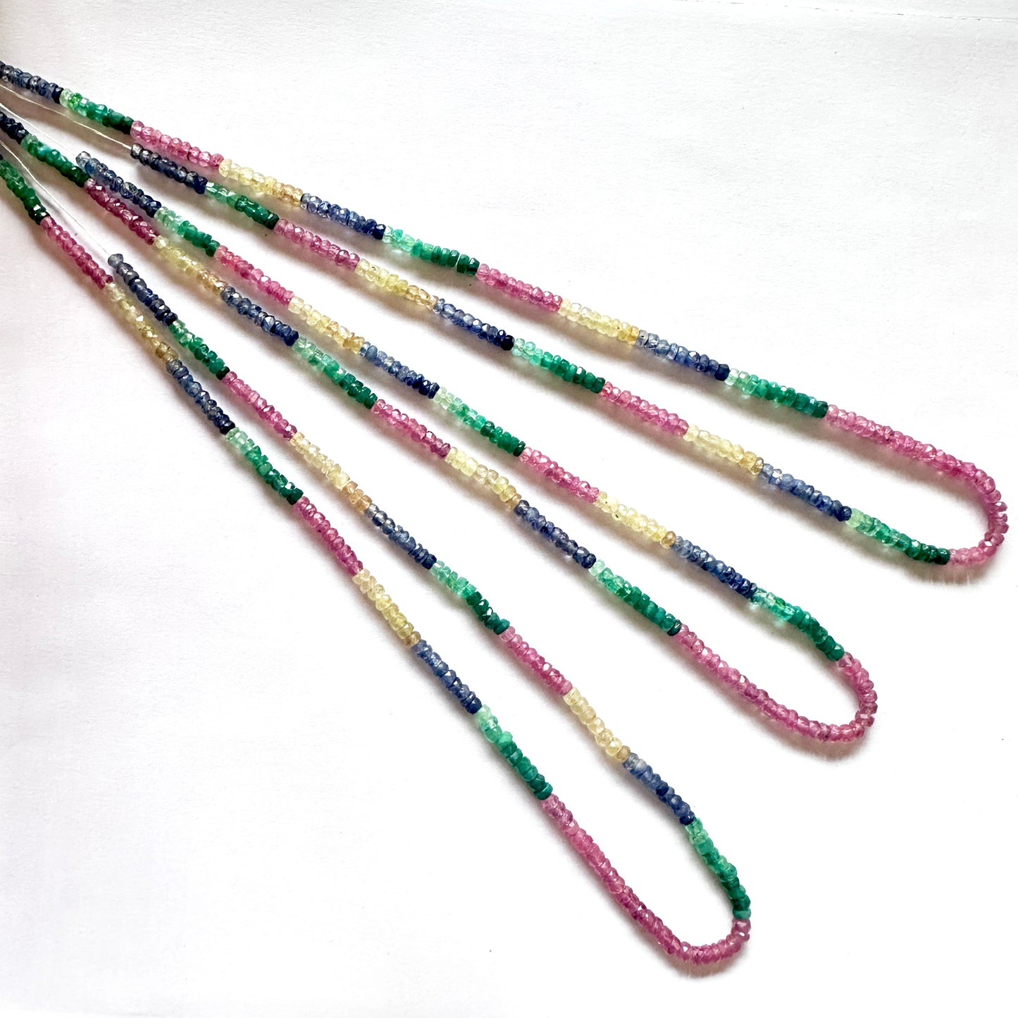 Faceted blue sapphire beads with radiant shine arranged neatly in a 41cm strand.