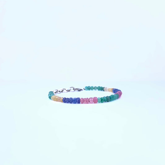 Close-up of multi precious gemstone bracelet with vibrant colour and sparkle.