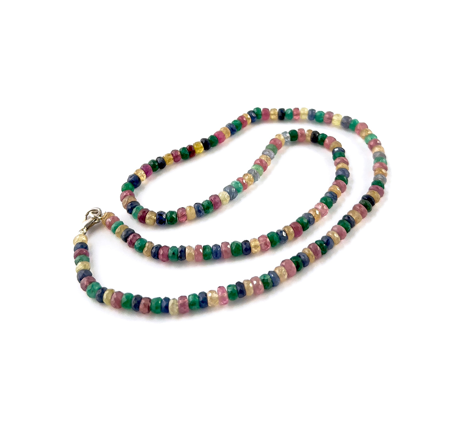 Close‑up of multi precious faceted rondelle beads highlighting their polished facets, colour depth and radiant shine.