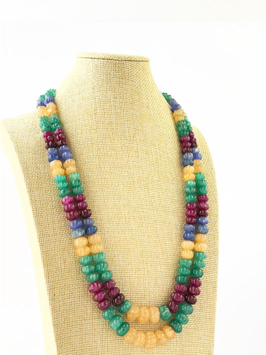 Layered multi‑quartz necklace crafted with carved pumpkin beads and adjustable fit.