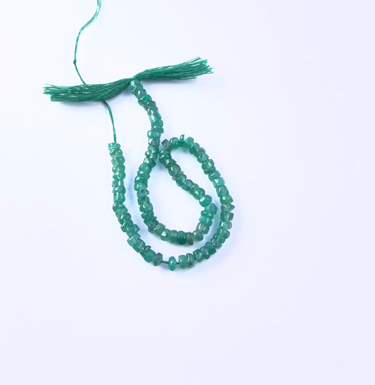Elegant green onyx stone beads strand 19cm, smooth wheel cut ideal for DIY jewellery making and creative projects.