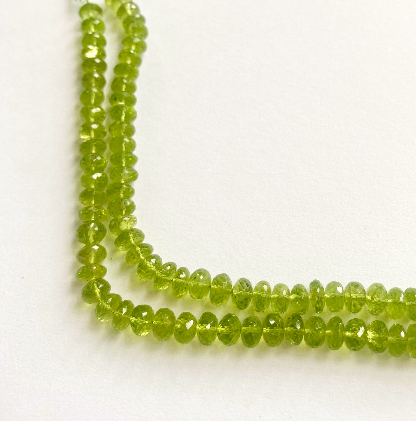 Hand-selected Peridot gemstone beads featuring brilliant shine and refined colour tones.
