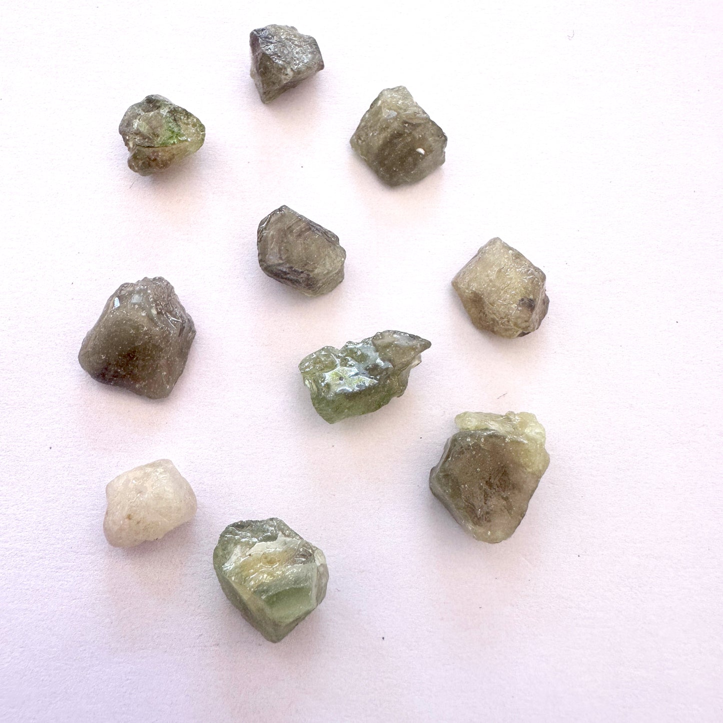 Assorted sapphire gemstones with rich colour and undrilled finish for custom jewellery.