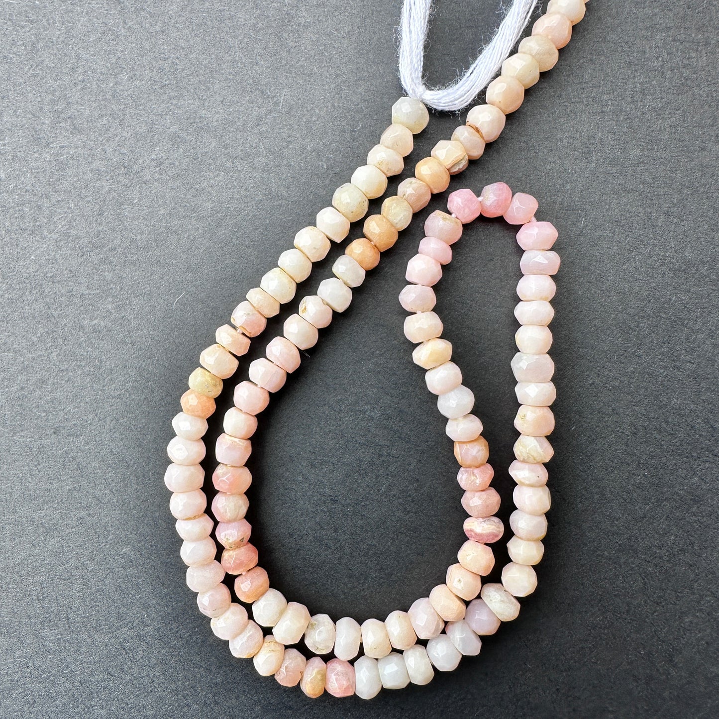 Handmade jewellery components featuring Pink Shaded Opal beads with consistent size and lustrous finish.