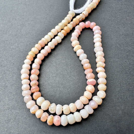 Close-up of Pink Shaded Opal stone beads showing faceted cut and natural gemstone sparkle.