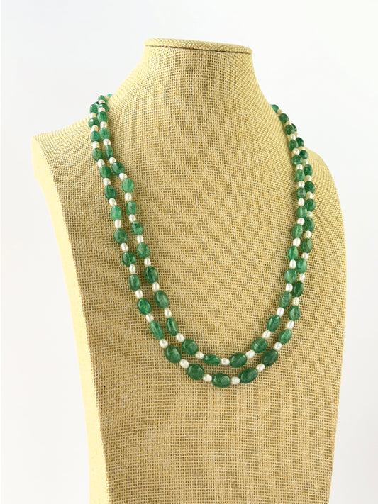 Layered quartz and shell pearl necklace crafted with smooth oval beads and adjustable fit.