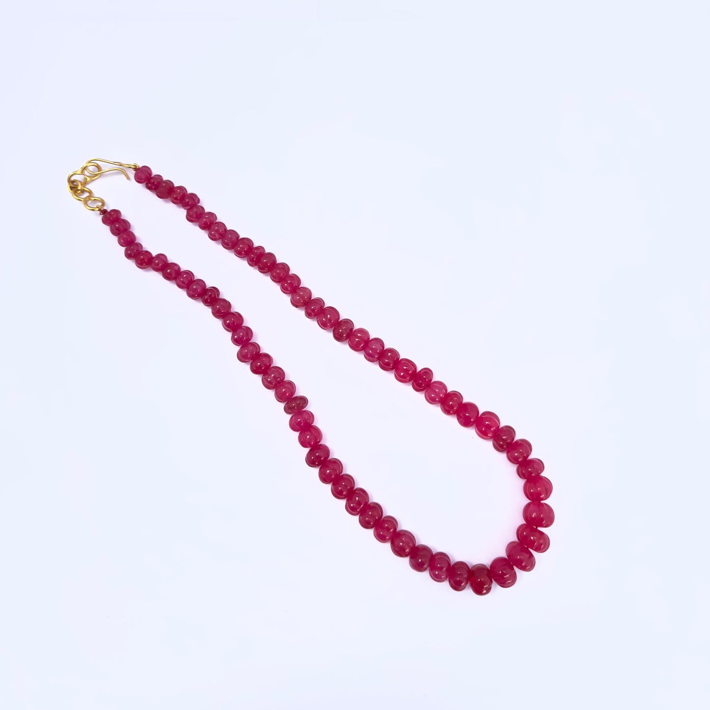 Handmade jewellery components in a Quartz necklace with elegant melon-cut design.