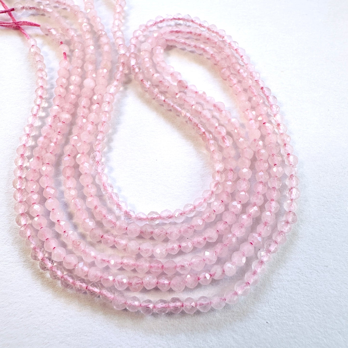 Handmade jewellery components featuring delicate 2.4mm Rose Quartz stone beads.