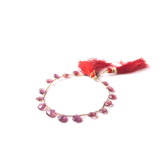 Faceted Ruby briolette beads with deep crimson hues, perfect gemstone beads for DIY jewellery making.