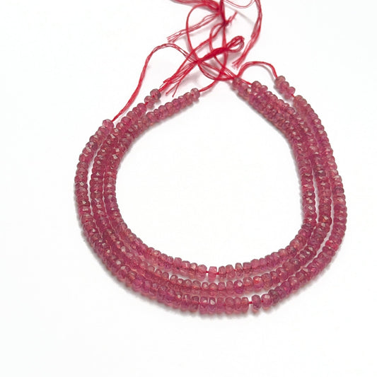 Bright ruby stone beads in faceted rondelle shape, showcasing shine and quality for handmade jewellery components.