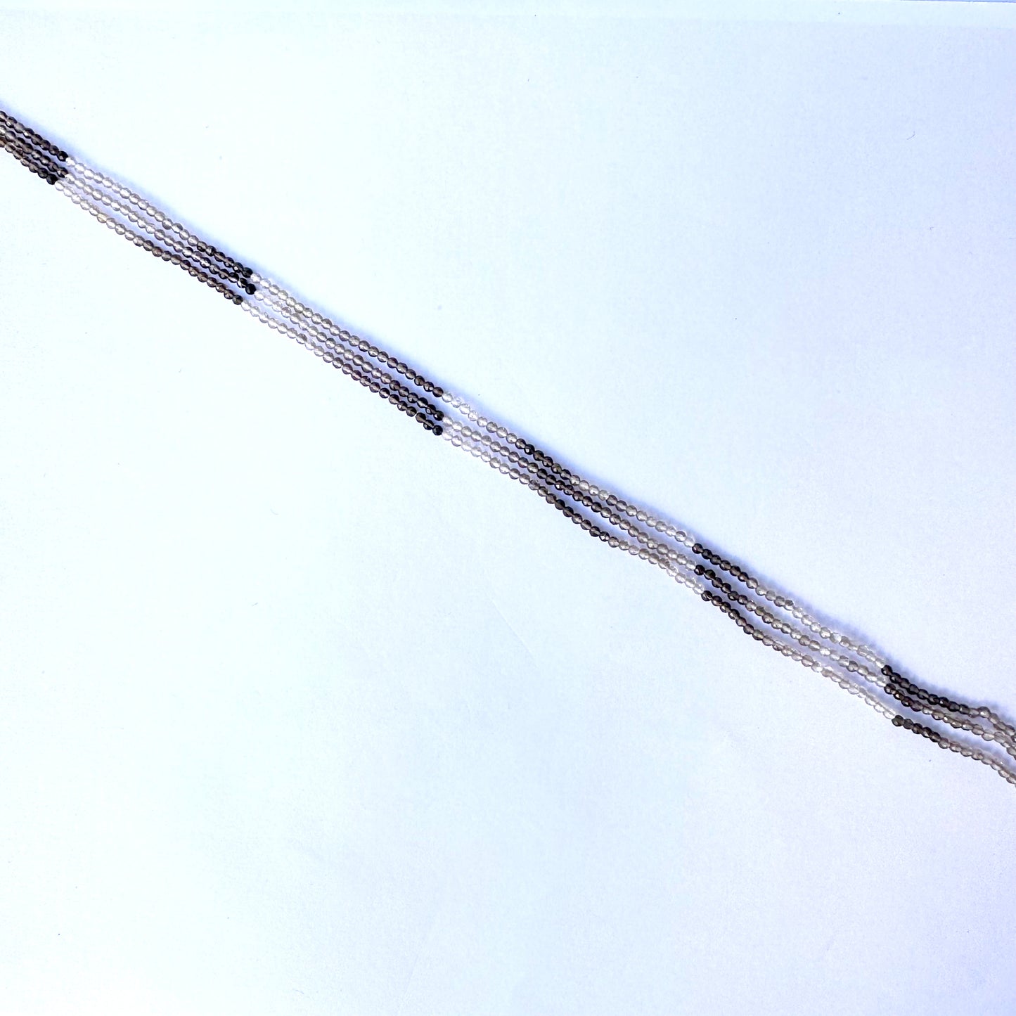 High-quality smoky quartz rondelles with 0.3mm bead holes and polished shine.