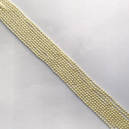 Delicate 2.7mm shell pearls with 0.4mm holes threaded neatly along a 41cm strand.