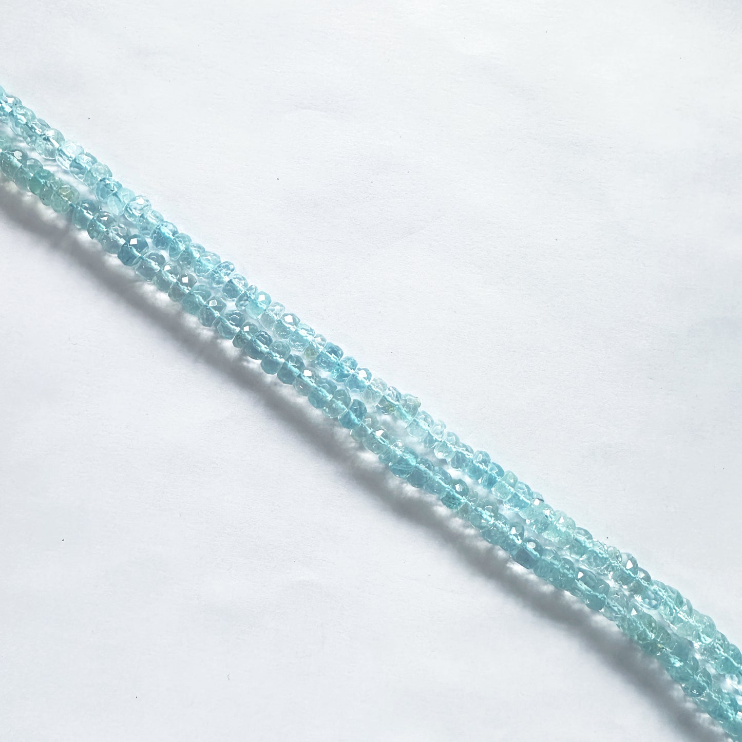 Sky Blue Topaz rondelle beads in 6–6.7mm sizes with sparkling blue colour and precision faceting.