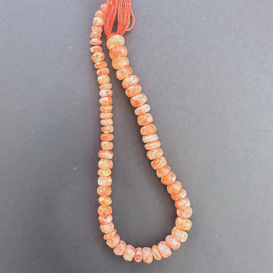 Natural gemstone beads in Sunstone, arranged on a 20cm strand with consistent cut.