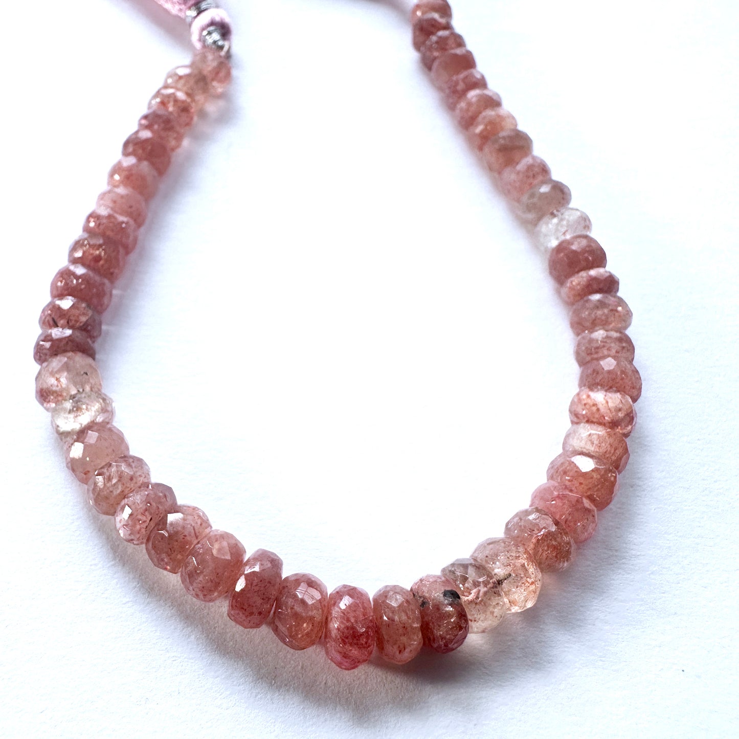 Handmade jewellery components Australia showcasing Sunstone beads with 0.5mm drill holes.