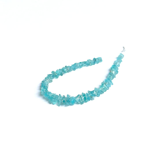 Close‑up of apatite rough stone beads highlighting their organic shape and vibrant colour for DIY jewellery.