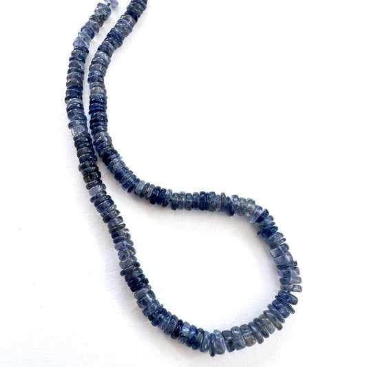 Natural gemstone beads in Tanzanite, arranged on a 20cm strand with consistent shape.
