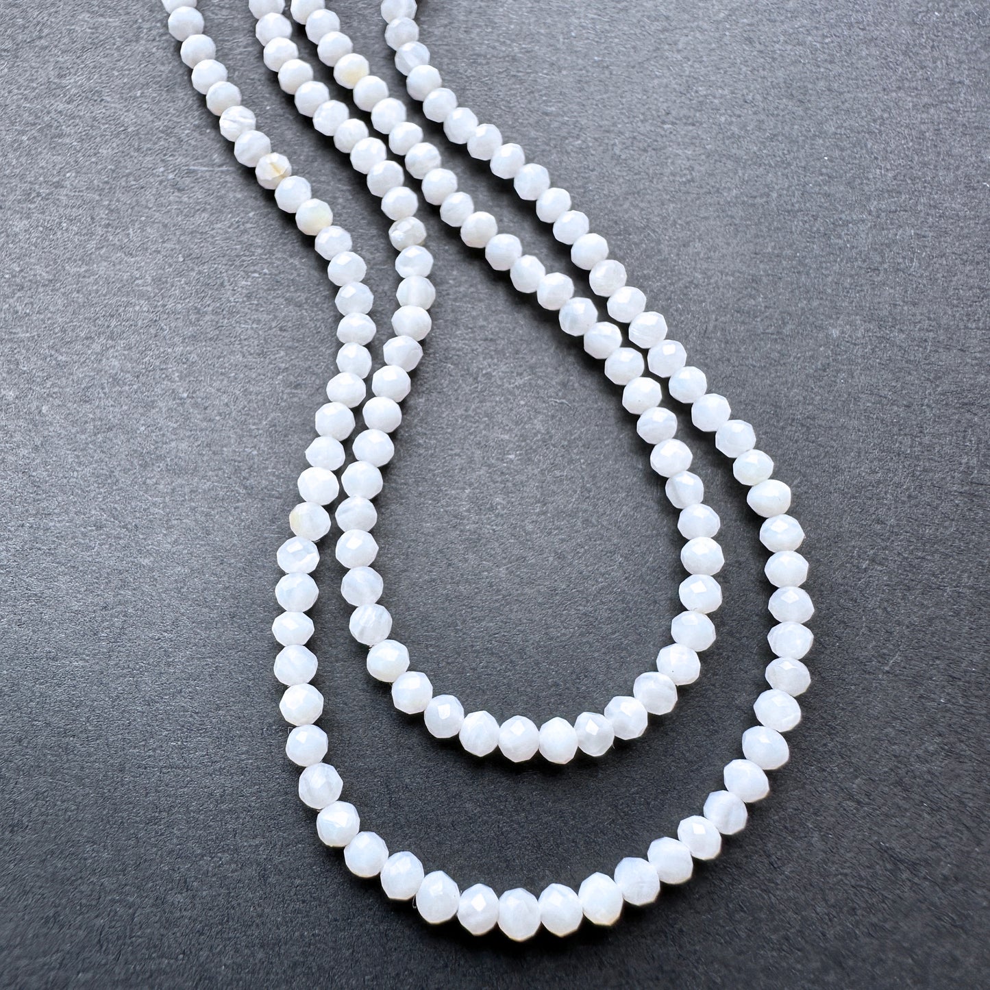 Natural gemstone beads in White Opal, 2.4mm size, ideal for delicate DIY jewellery designs.