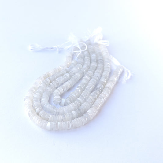 Genuine White Rainbow Moonstone stone beads for DIY jewellery featuring polished wheel shaping and luminous colour.