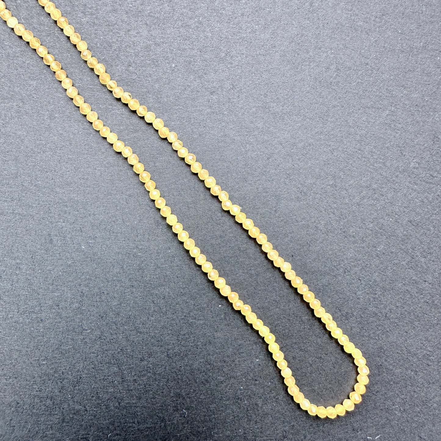 Handmade jewellery components featuring Yellow Chalcedony beads with consistent size and lustrous finish.