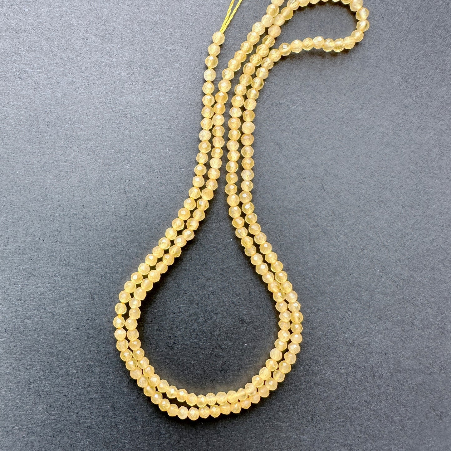 Natural gemstone beads in Yellow Chalcedony, 2.2mm size, ideal for delicate DIY jewellery designs.
