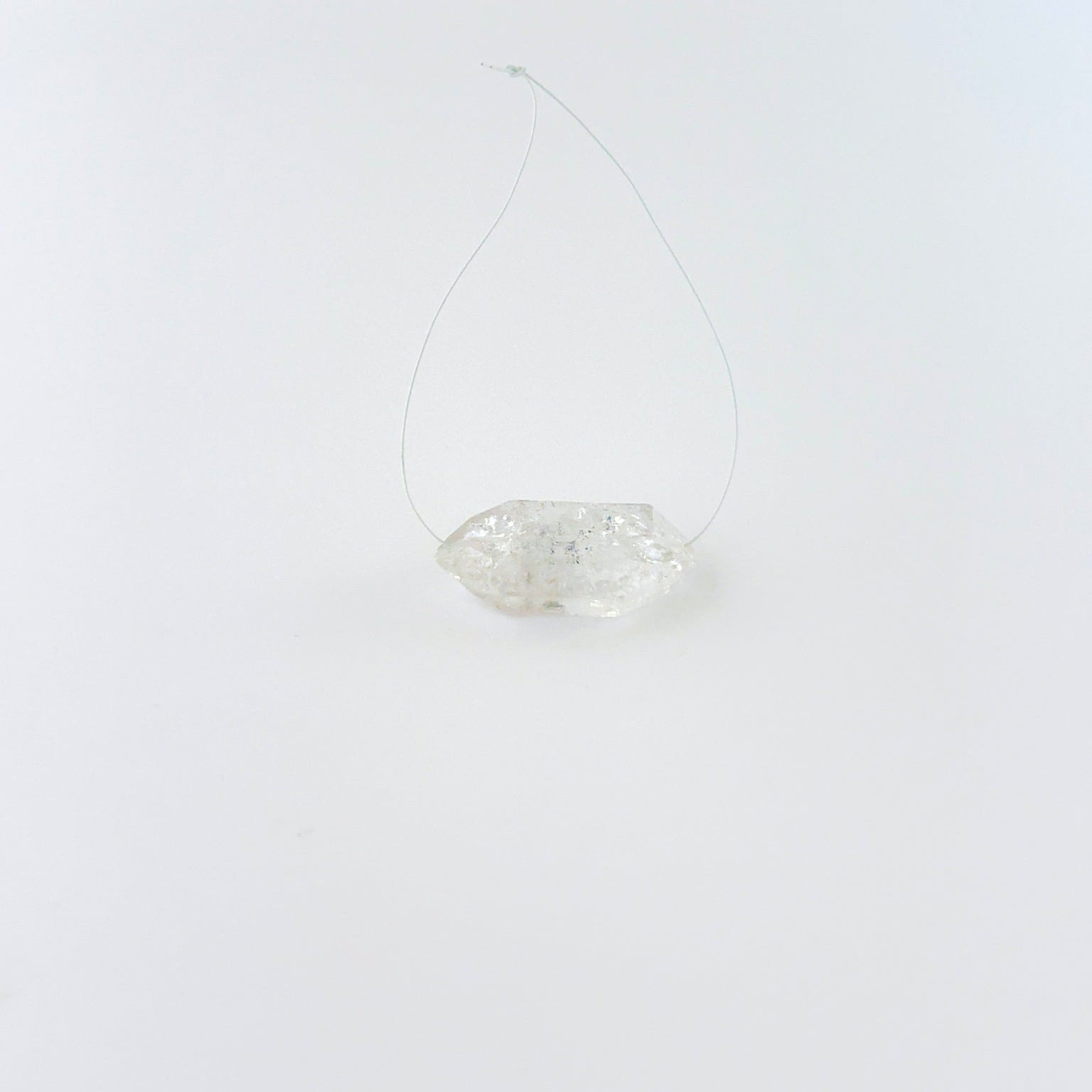 Herkimer Diamond rough top drilled crystal showing natural clarity and angular formation