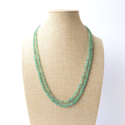 Soft pastel Beryl faceted rondelle beads arranged in a two‑strand necklace, ideal for handmade jewellery makers.