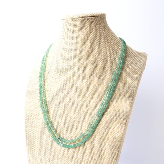 Genuine Beryl gemstone beads in faceted rondelle cut showing soft shimmer and clarity for DIY jewellery projects.