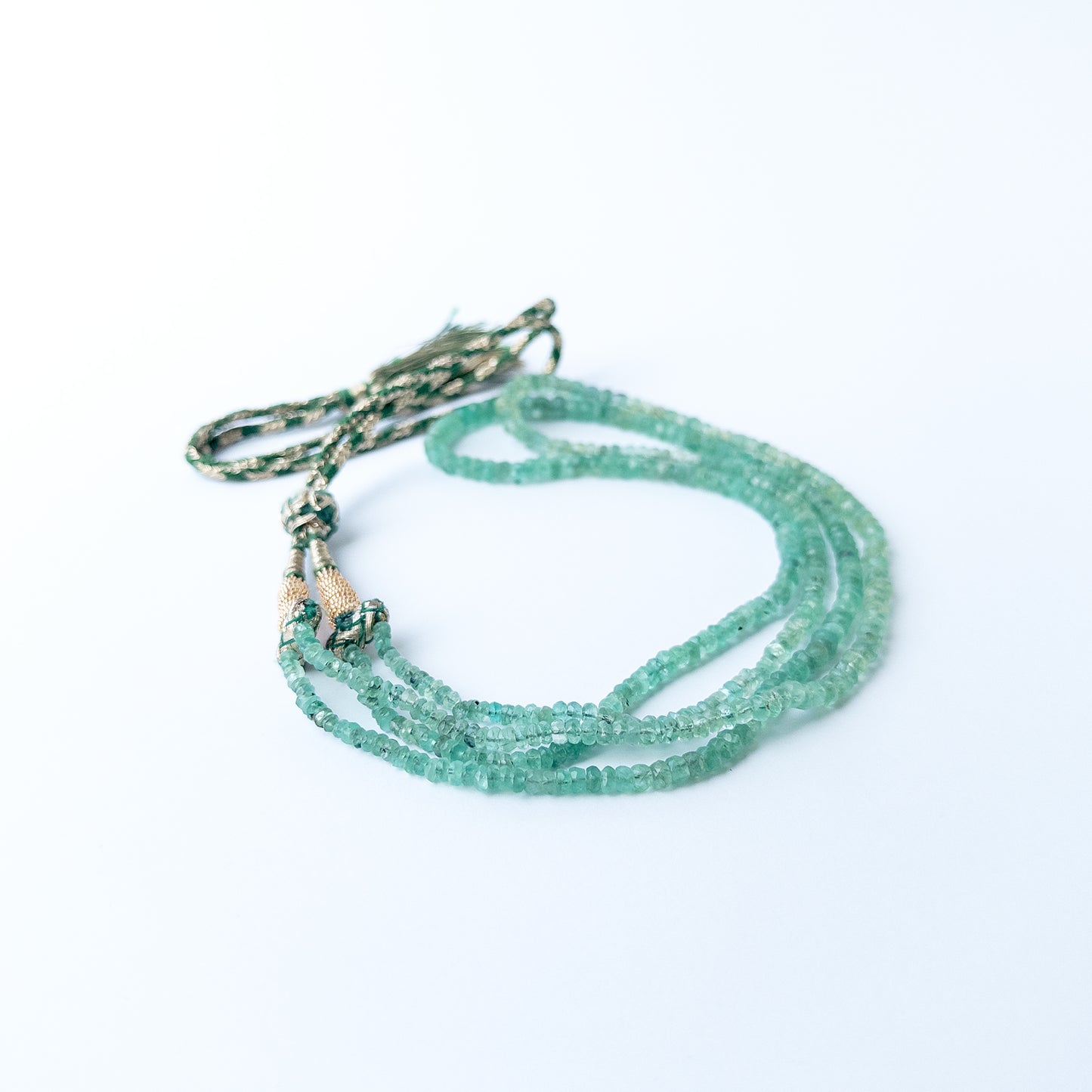 High quality Beryl faceted rondelle beads in 3.3–5.5mm sizes, arranged in a refined two‑strand necklace.