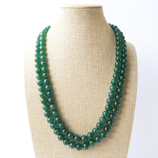 Rich green Emerald smooth round beads arranged in a two‑strand necklace for handmade gemstone jewellery making.