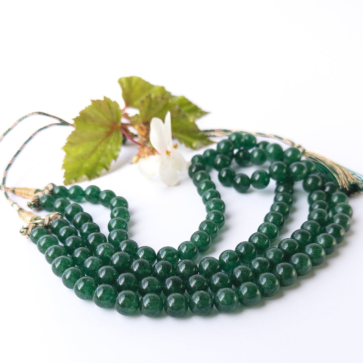 Premium Emerald stone beads arranged in a two‑strand necklace, ideal for DIY gemstone bead jewellery makers.
