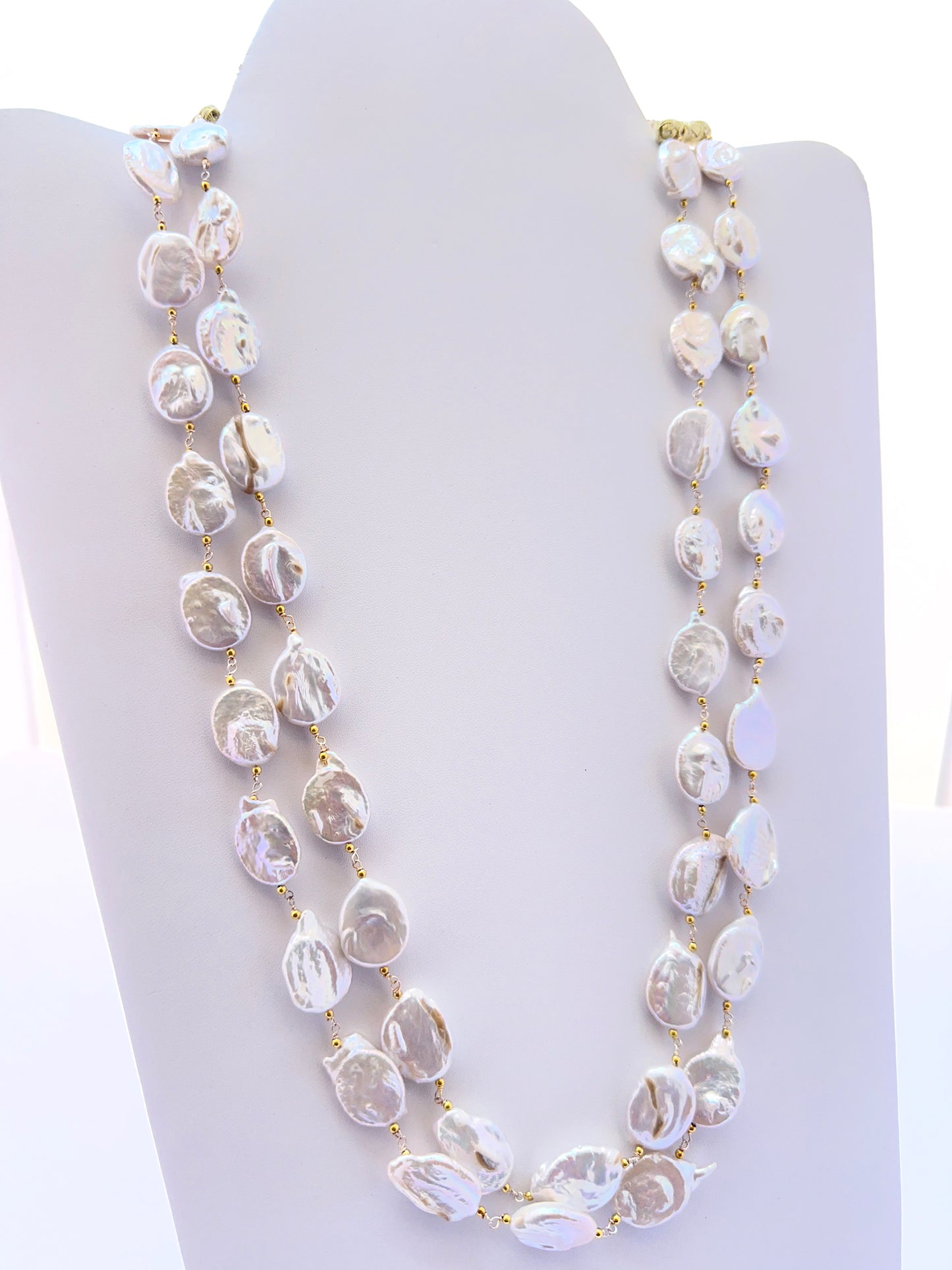 Freshwater pearl necklace with baroque pearls showing organic shapes and lustrous shine.