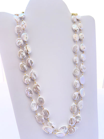 Freshwater pearl necklace with baroque pearls showing organic shapes and lustrous shine.