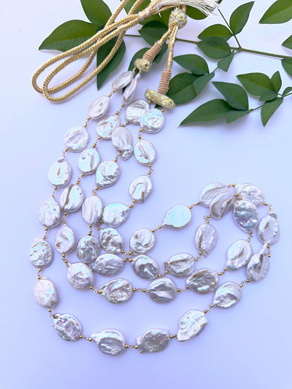 Natural freshwater pearl necklace with textured baroque pearls arranged in a refined layout.