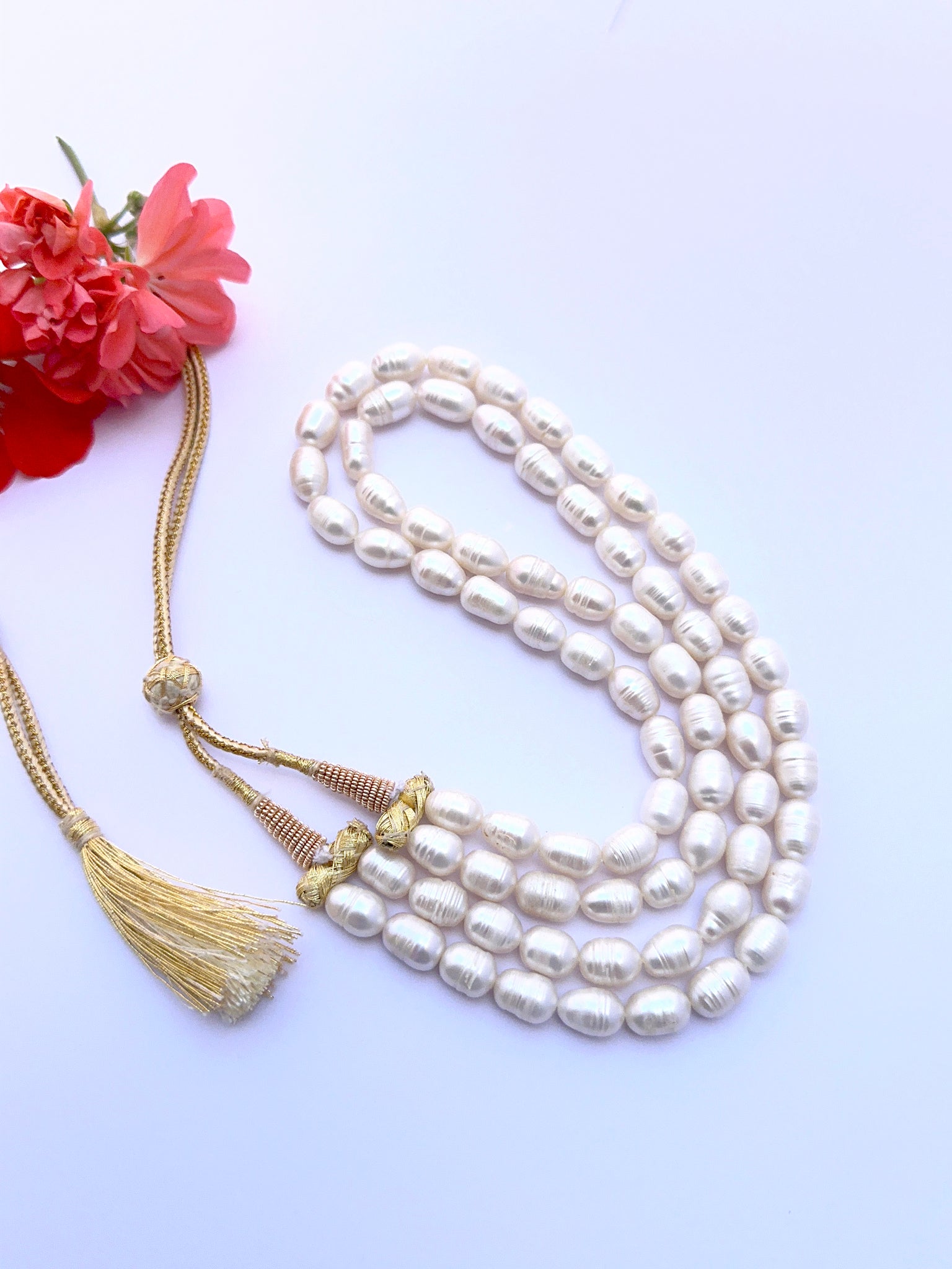 Natural freshwater pearl necklace with oval textured pearls arranged in a graceful two‑strand style.
