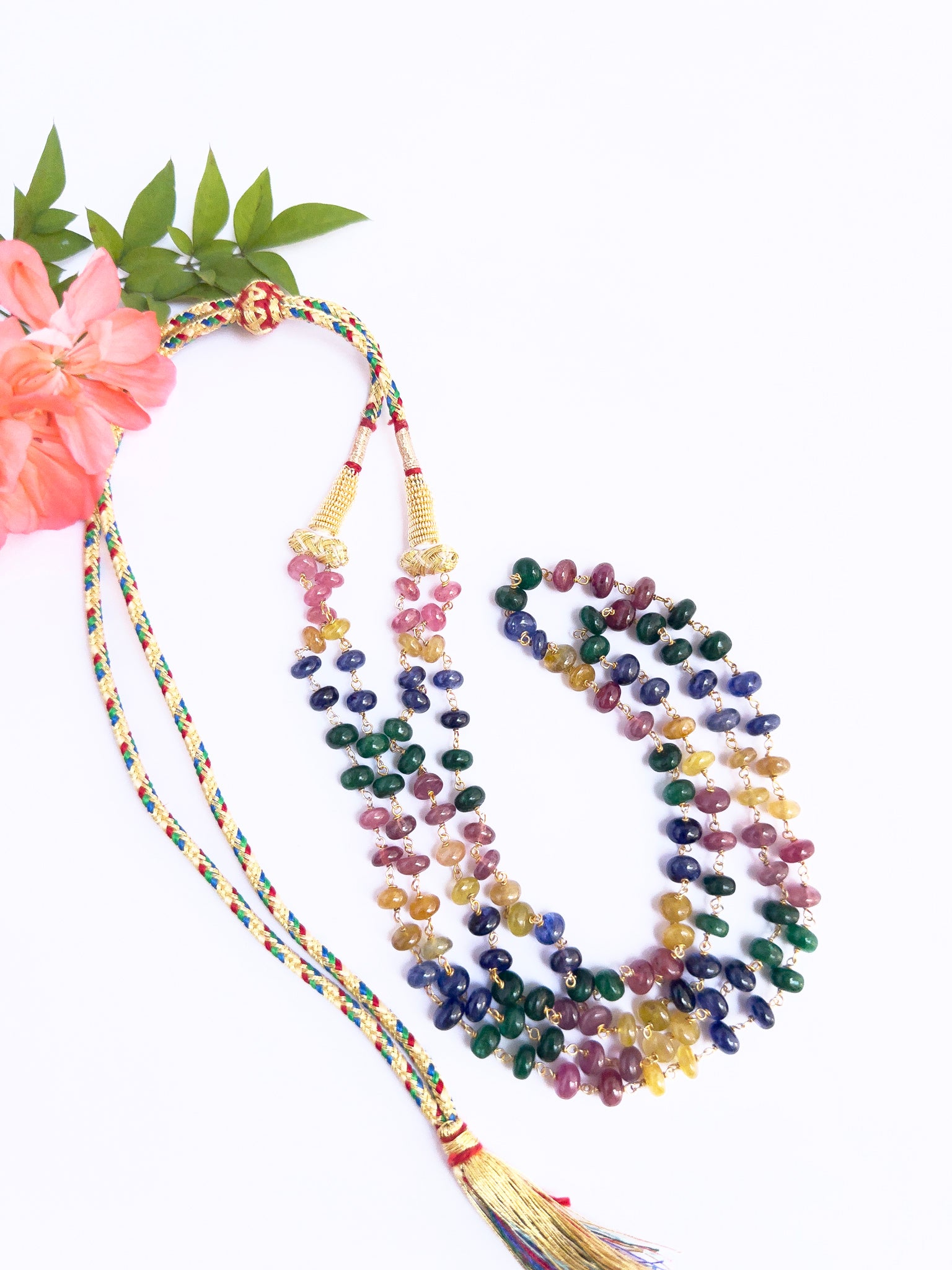 Multi precious necklace showcasing natural gemstone beads, smooth rondelle cut, colourful fashion appeal.