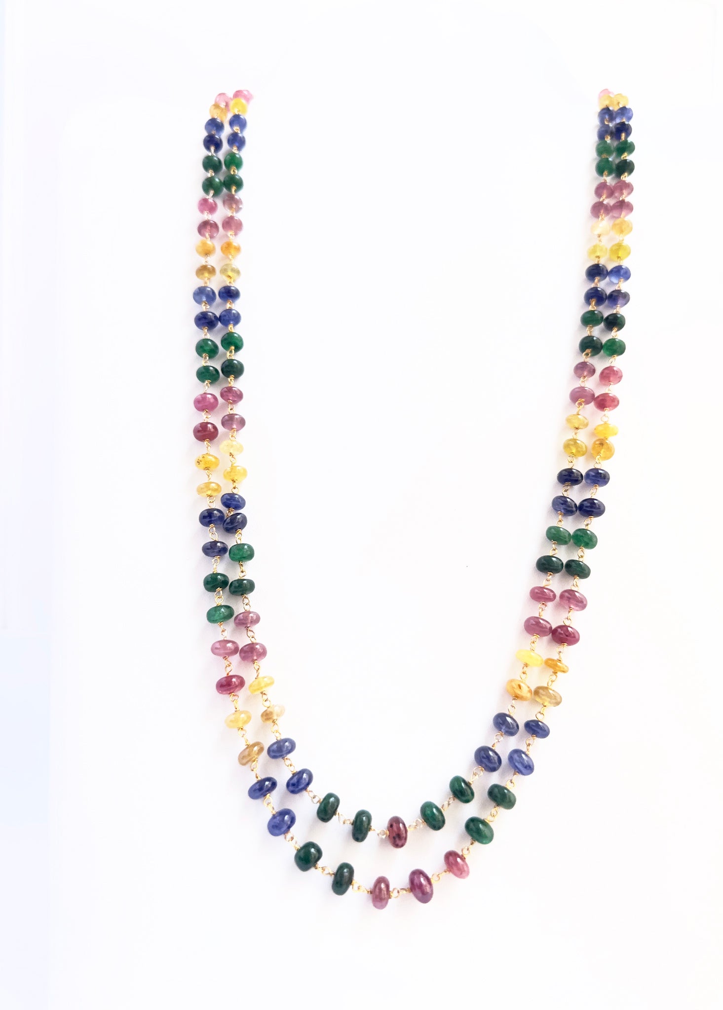Gemstone beads necklace combining Ruby, Blue Sapphire, Yellow Sapphire, and Emerald, radiant shine, versatile styling.