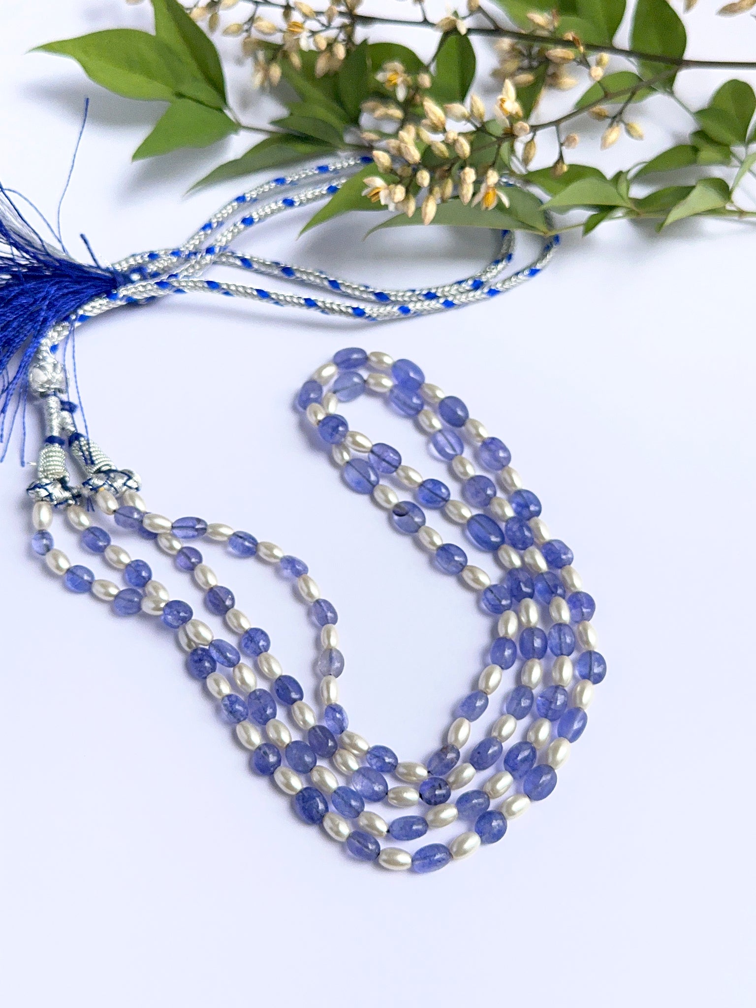 Quartz and pearl necklace with smooth oval beads showing gentle shine and clarity.