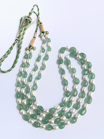 Quartz and pearl necklace with smooth oval beads showing soft shine and natural clarity.