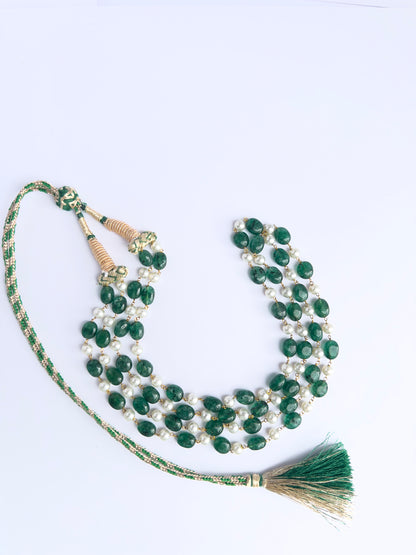 Quartz and shell pearl necklace, finished with silk tassel, versatile and refined design.