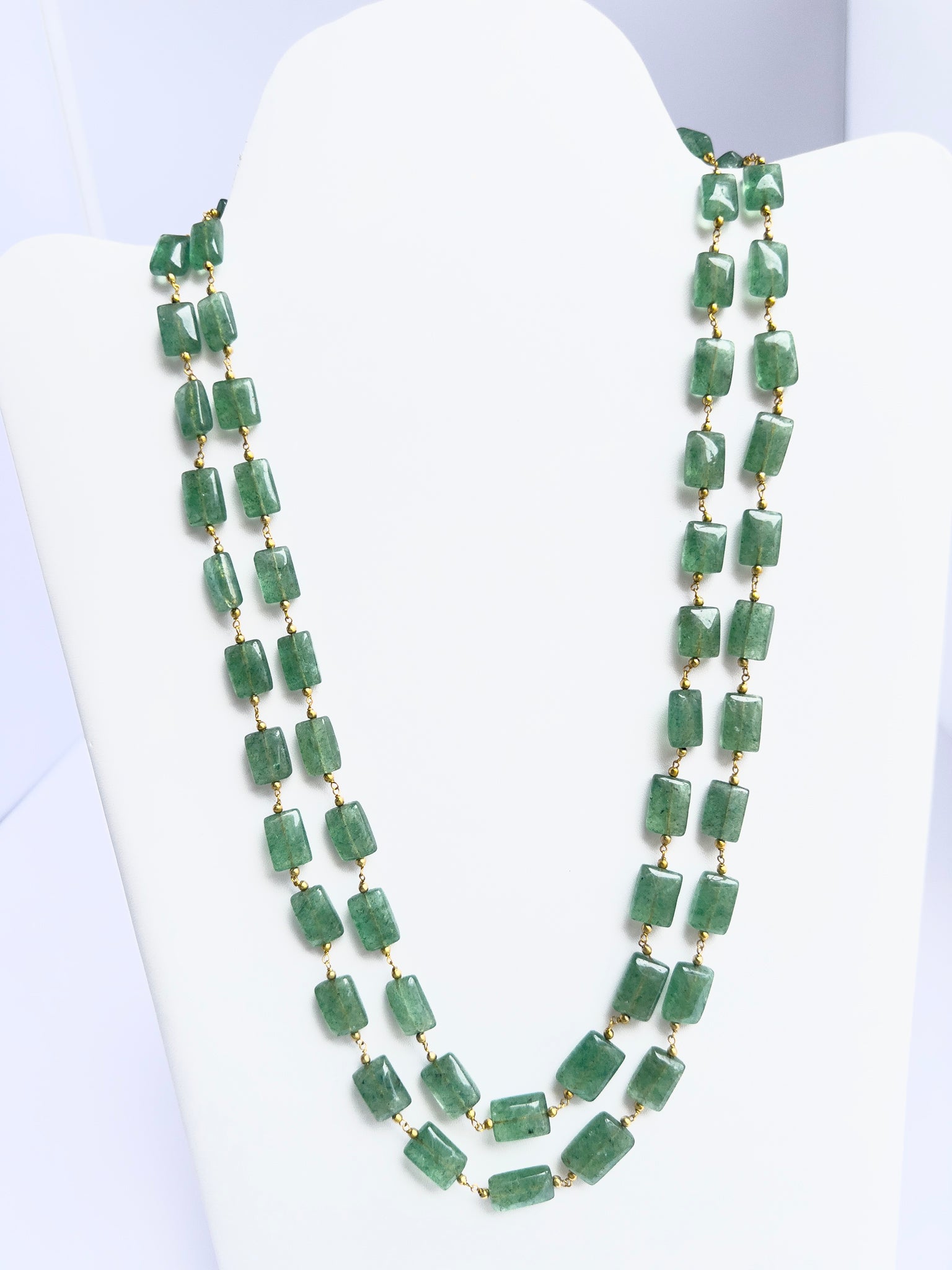 Two-strand quartz necklace with rectangular beads, polished finish, elegant geometric design.