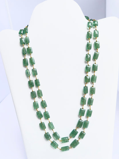Two-strand quartz necklace with rectangular beads, polished finish, elegant geometric design.