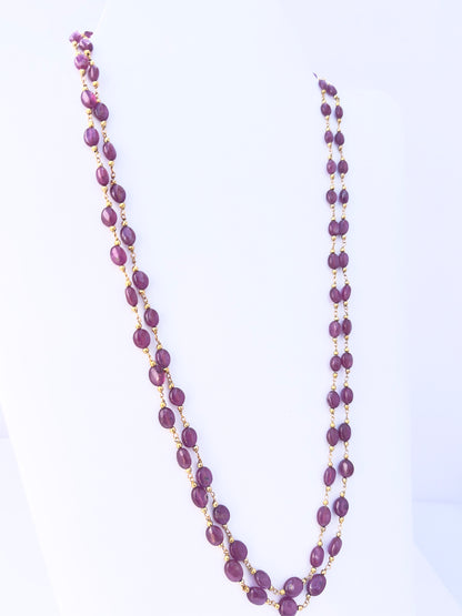 Ruby stone beads necklace, deep dyed colour, smooth oval design, 52–54cm strand length.